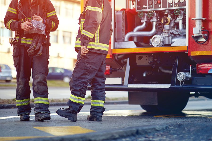 Fire Department Insurance - Group of Firefighters Waiting to Go On a Fire Call